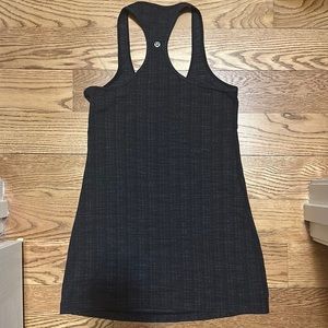NWOT. Woman’s Lululemon muscle tank top. I believe size 8.
